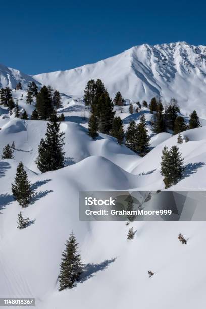 Undulating Snowy Mountainscape Stock Photo - Download Image Now - La Plagne, Alpine climate, Beauty