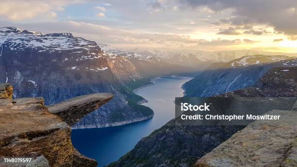 Norway Famous Trolltunga During The Sunrise With Beautiful View On The Fjord Stock Photo - Download Image Now
