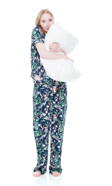 istock Attractive female in pajamas 1148021168