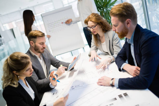 istock Business people working together on project and brainstorming in office 1148021204