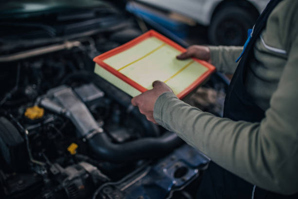 istock Auto mechanic working in garage 1148021315