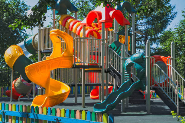 istock Empty playground in a city park on a hot sunny summer day. 1148021376