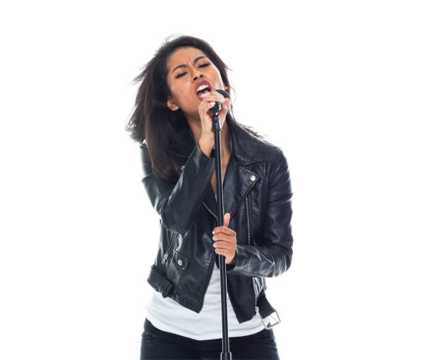 istock Bautiful woman wearing a leather jacket and singing like a rock star 1148021917