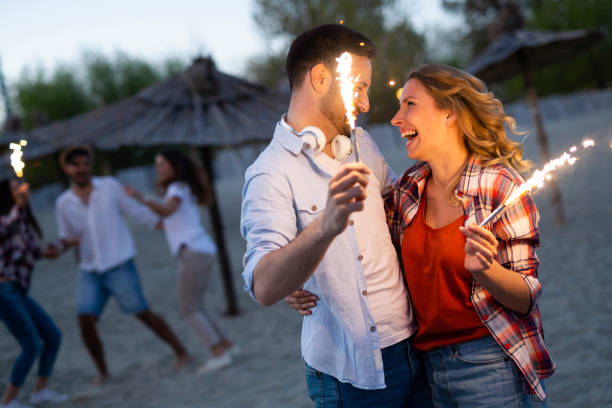 istock Truly happy playful couple having fun at beach 1148022998