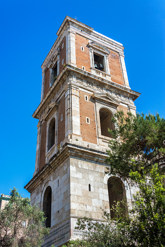 Old bell tower of Santa Marta Church in historic Naples, Italy