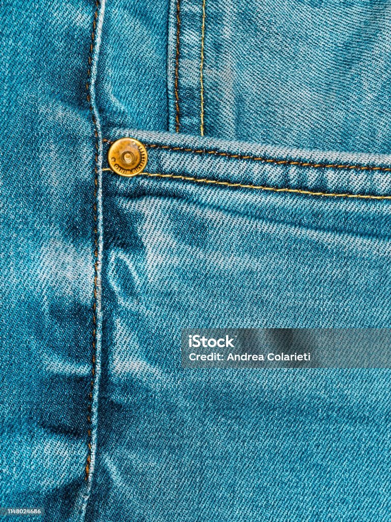 Close-up of jeans pants with pockets, seams and buttons Close-up Stock Photo