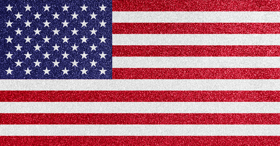 American national flag on glitter texture.