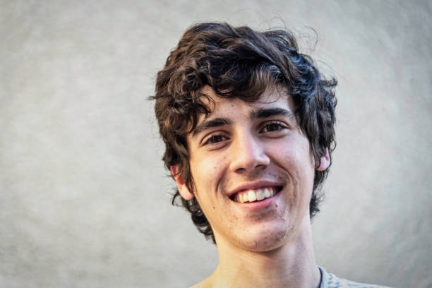 istock Smiling young man with acne 1148027153