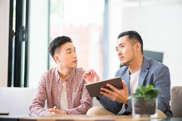 istock Asian businessman having discussion 1148027832