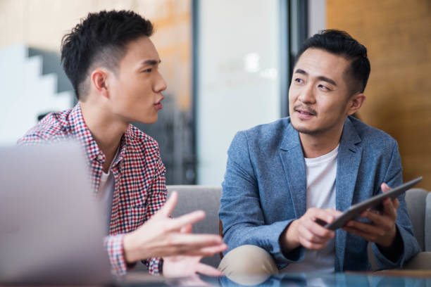 istock Asian businessman having discussion 1148027840