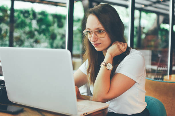 istock A Woman Freelancer Working at Coffee Shop 1148028474