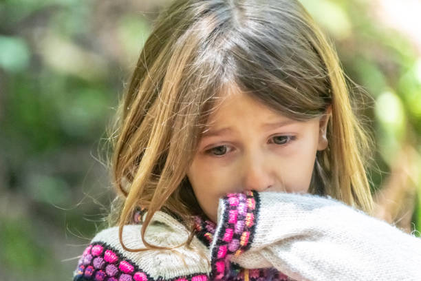 istock Sad crying little child girl 1148029599