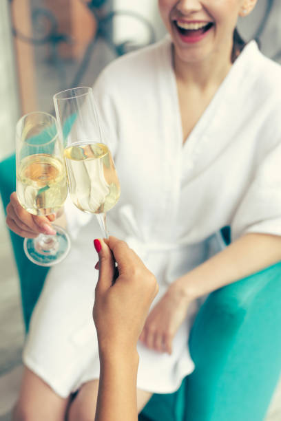 istock Selective focus of the clanging glasses with champagne in them 1148033052