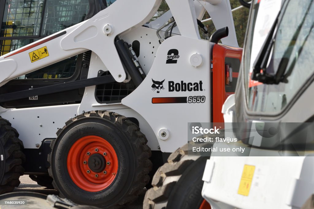 Bobcat Schwerlastfahrzeug und Logo - Lizenzfrei Rotluchs Stock-Foto