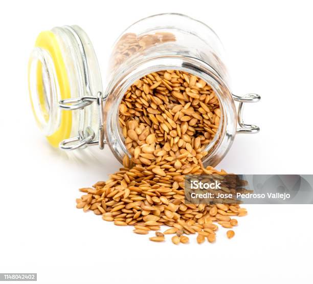 Golden Flax Seeds Micronutrient Beneficial For The Organism That Prevents And Cures Ailments Rich In Fiber And Nutrients Beneficial For Healt Skin Weight Loss Cholesterol Reduction Celia Stock Photo - Download Image Now