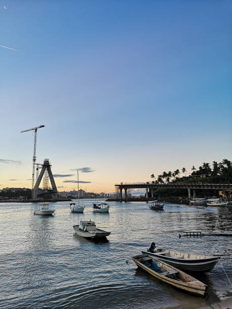 istock Landscape with bridge construction and boats in the water 1148044530