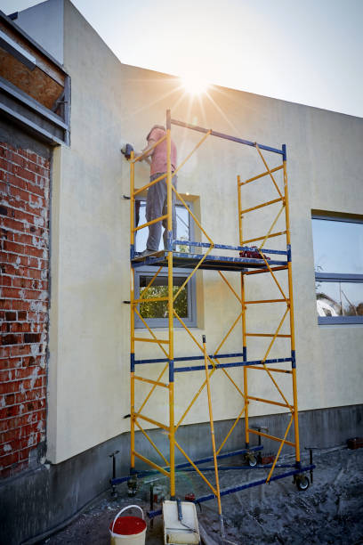 istock Builder at the finish house working with the tool. 1148046552
