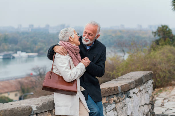 istock Confident Mature Couple Near the River 1148047945