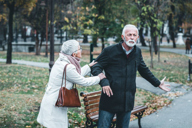 istock Mature Couple Having a Debate in the Public Park 1148047994