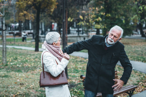 istock Mature Couple Having a Debate in the Public Park 1148047997