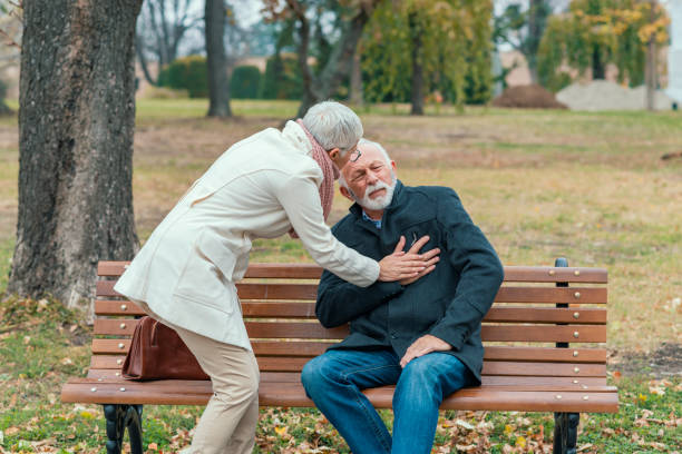 istock Senior Couple with Health Problems in City Park 1148048014