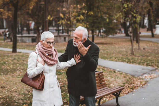 istock Mature Couple Having a Debate in the Public Park 1148048083