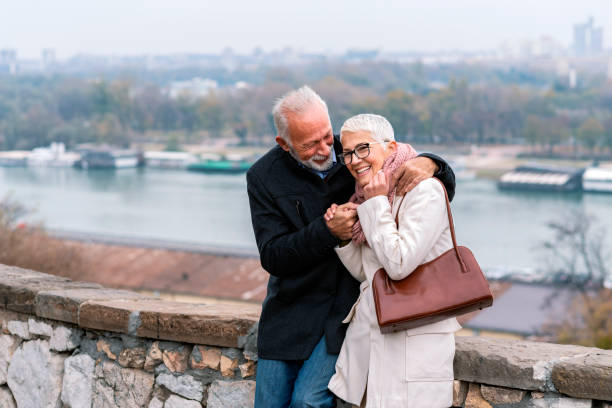 istock Confident Mature Couple Near the River 1148048145