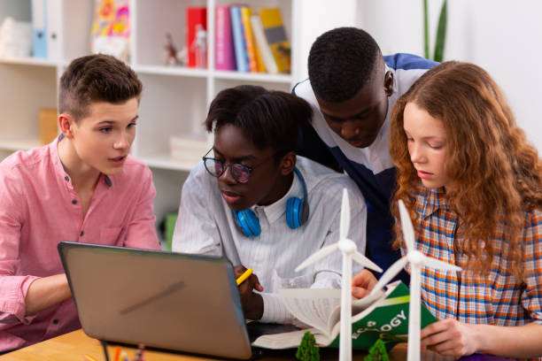 istock Four students feeling involved in brainstorming about ecology 1148048918