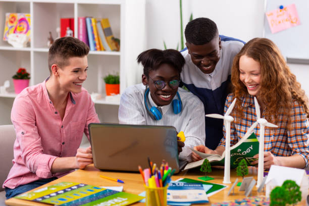 istock Cheerful teenagers feeling joyful while studying ecology together 1148048942