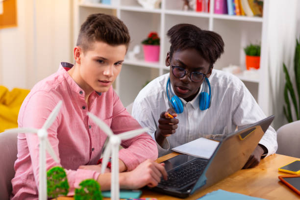 istock Best friends studying together while doing ecology project for school 1148049020