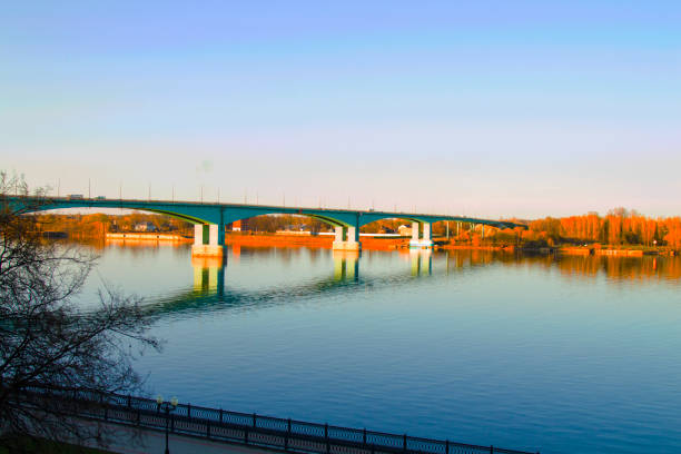 istock eliable large long bridge across a wide river, spring time 1148054869