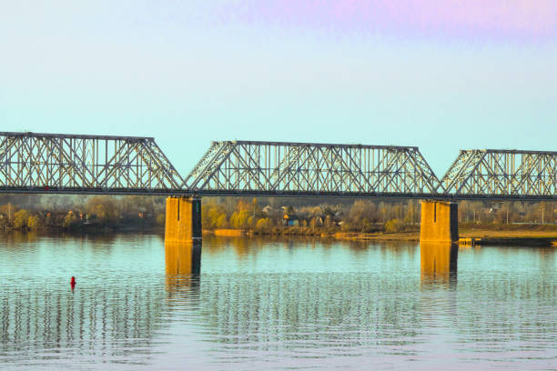 istock eliable large long bridge across a wide river, spring time 1148054909