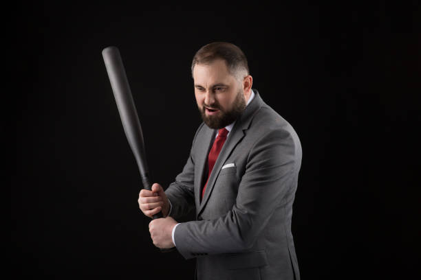 bearded man in suit and red tie with baseball bat - home run baseball baseball bat businessman imagens e fotografias de stock