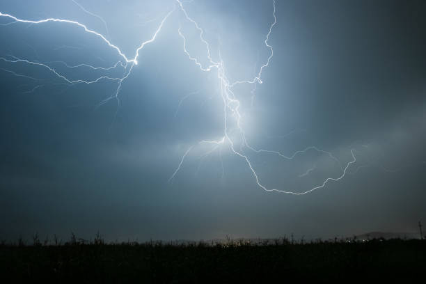 istock Lightning in the sky over the corn fields over Transylvania, Romania. 1148055656