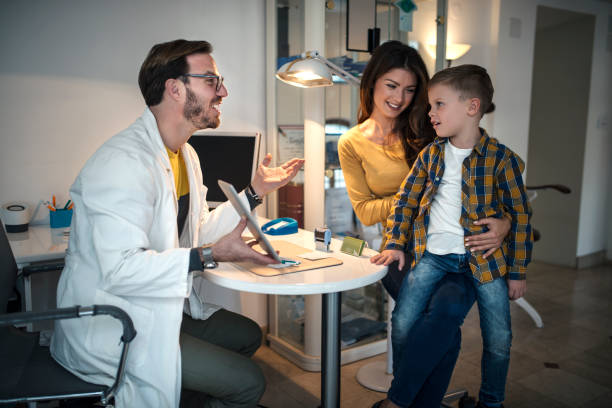 istock mother with her son in an office with an ophthalmologist 1148060607