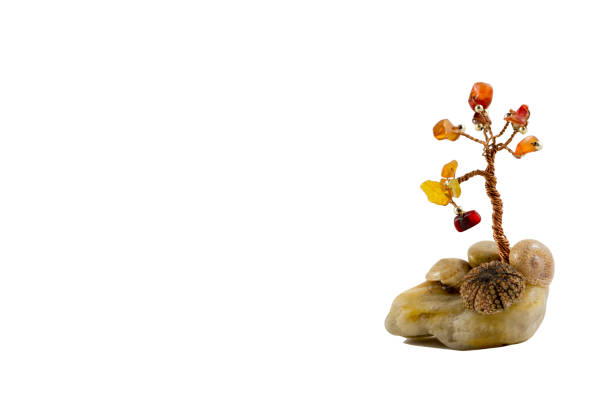 crystal stone with seashells and copper wire tree with colored stones - tree of life
