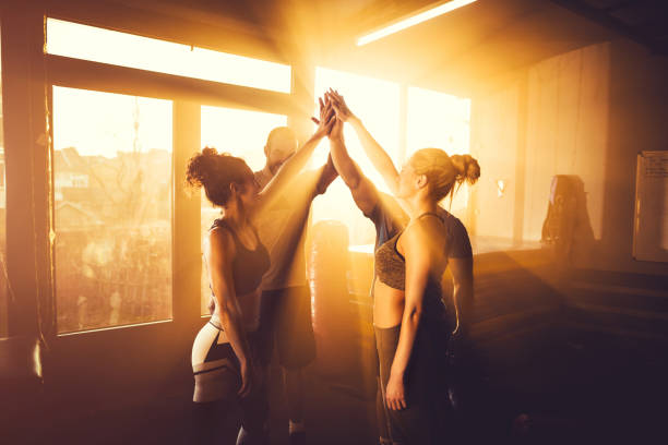 istock Athletes high fives after successful workout 1148070601