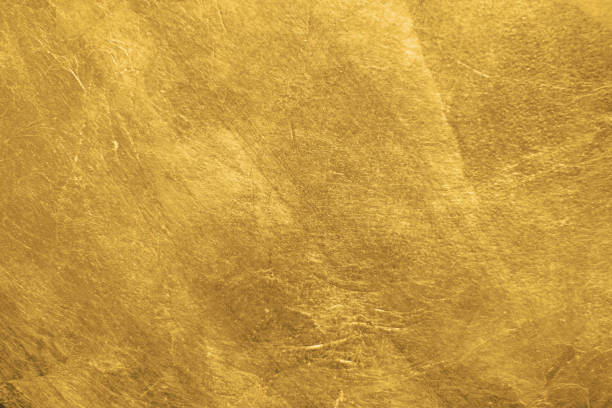 istock gold foil metallic textured background 1148076971