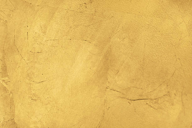 istock gold foil metallic textured background 1148076972
