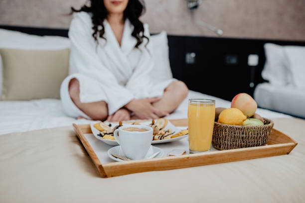istock Breakfast in bed in hotel room 1148078316