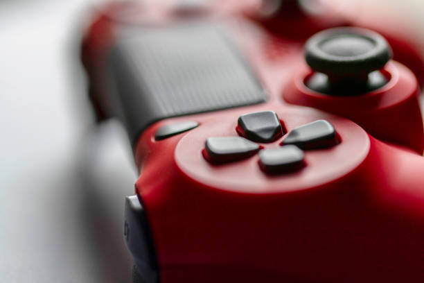 Close up of a wireless red e-sports gaming controller.