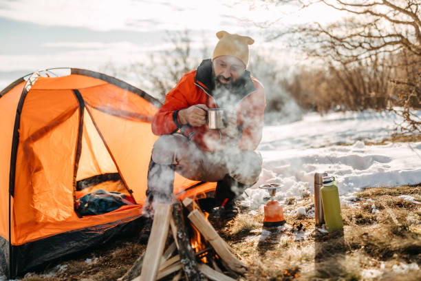 istock Man preparing food on mountain 1148091266