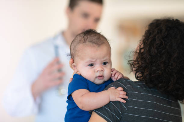 istock Mother holding her toddler 1148092150