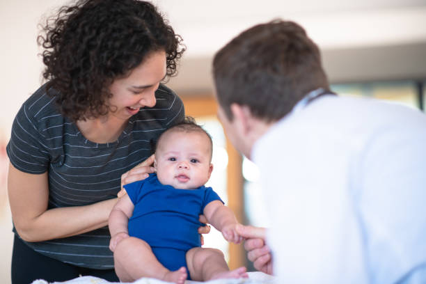 istock Mother holding her toddler 1148092155