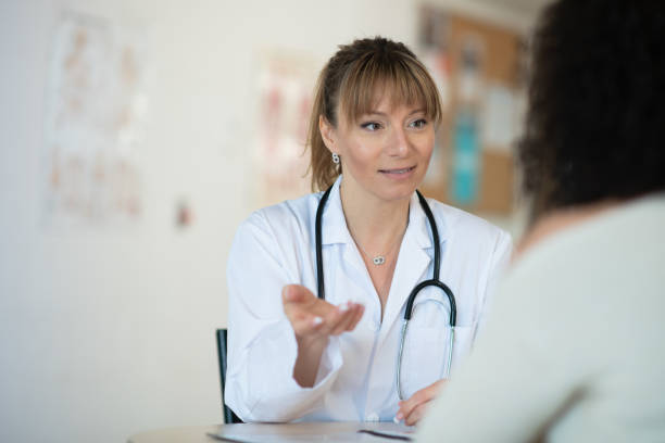 istock Doctor speaking to patient 1148092247