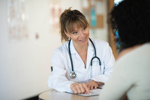 istock Doctor speaking to patient 1148092250