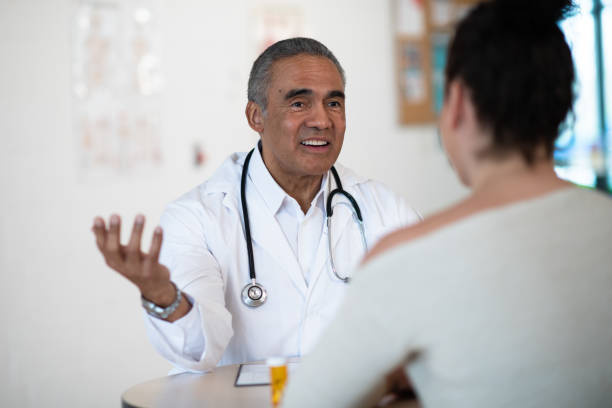 istock Male doctor talking to his patient 1148092280