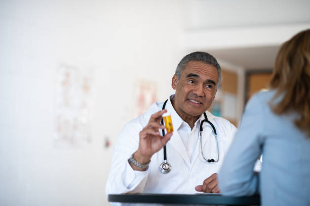 istock Male doctor talking to his patient 1148092287