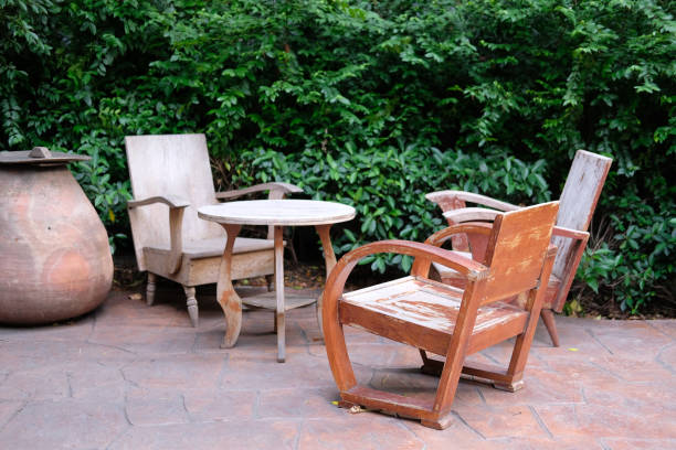 istock wooden table & chair in garden 1148093090
