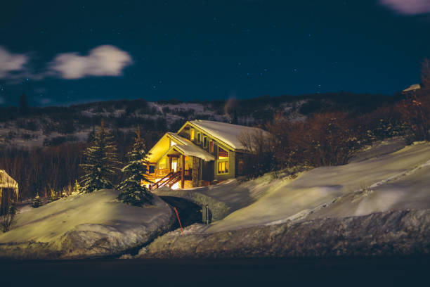 istock Snowy cabin in the mountains 1148093557
